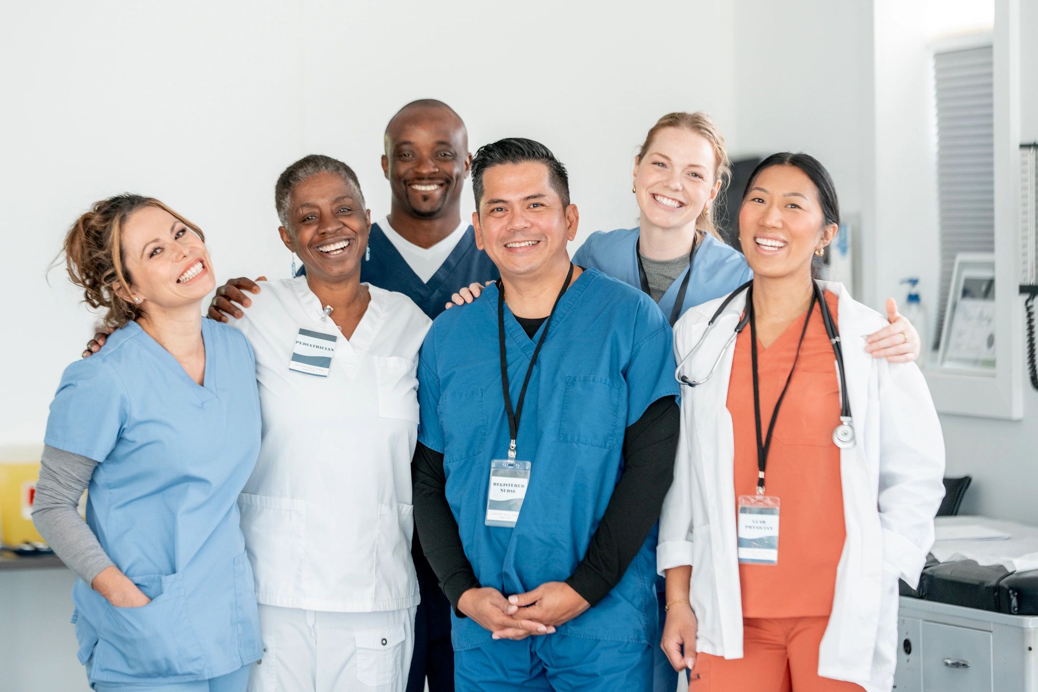 Diverse medical staff group photo in a clinic